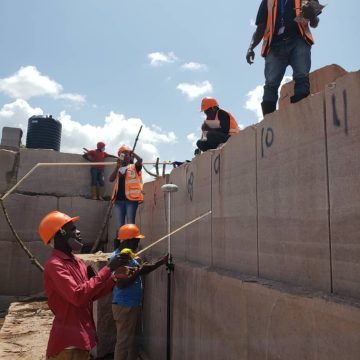 Inspectors from DGSM using a Real Time Kinematic (RTK) gadget in evaluating how much granite material was extracted from Mining Lease, ML1890 in Mityana District.